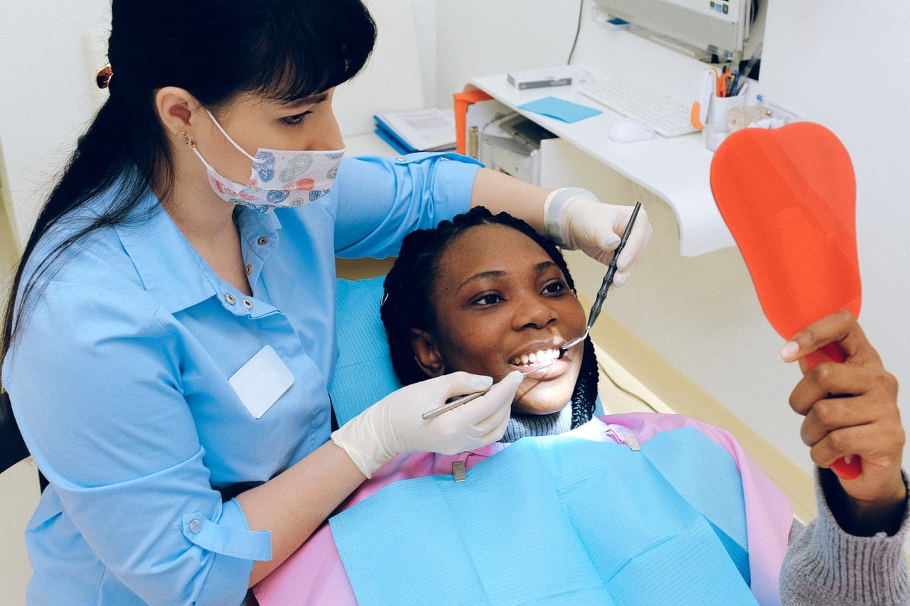 pexels-anna-shvets-3845653 Dentist checking Patient